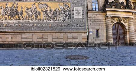 Stock Photo - "Paved road with Fuerstenzug, Procession of the Princes, and the gate to Stallhof, stable yard, Dresden, Saxony, Germany, Europe". Fotosearch