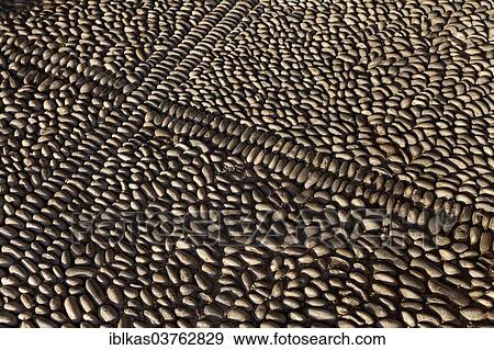 "Pavement made from upright pebbles, Knight Street or Odos Hippoton, historic town centre, Rhodes, Island of Rhodes, Dodecanese, Greece, Europe" View Large Photo Image Stock Photo - "Pavement made from upright pebbles, Knight Street or Odos Hippoton, historic town centre, Rhodes, Island of Rhodes, Dodecanese, Greece, Europe". Fotosearch