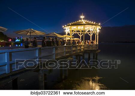 "Pavilion with a bar on Lake Constance, night scene, Bregenz, Vorarlberg, Austria, Europe" View Large Photo Image Stock Image - "Pavilion with a bar on Lake Constance, night scene, Bregenz, Vorarlberg, Austria, Europe". Fotosearch