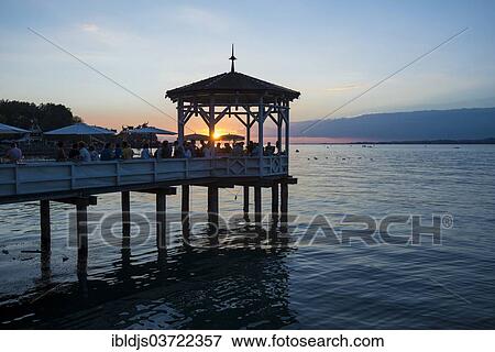 "Pavilion with a bar on Lake Constance at sunset, Bregenz, Vorarlberg, Austria, Europe" View Large Photo Image Stock Photo - "Pavilion with a bar on Lake Constance at sunset, Bregenz, Vorarlberg, Austria, Europe". Fotosearch