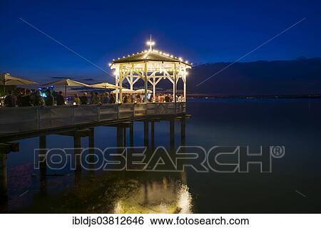 "Pavilion with a bar on Lake Constance, at night, Bregenz, Vorarlberg, Austria, Europe" View Large Photo Image Stock Photograph - "Pavilion with a bar on Lake Constance, at night, Bregenz, Vorarlberg, Austria, Europe". Fotosearch