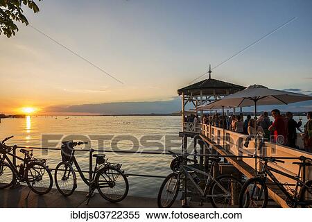 "Pavilion with a bar on Lake Constance at sunset, Bregenz, Vorarlberg, Austria, Europe" View Large Photo Image Stock Photography - "Pavilion with a bar on Lake Constance at sunset, Bregenz, Vorarlberg, Austria, Europe". Fotosearch