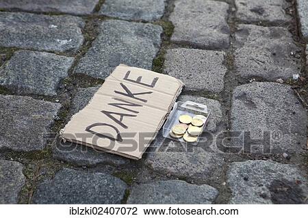 "Paving stones, sign with the message Danke, German for Thanks, with coins in front, Cologne, North Rhine-Westphalia, Germany, Europe" View Large Photo Image Stock Image - "Paving stones, sign with the message Danke, German for Thanks, with coins in front, Cologne, North Rhine-Westphalia, Germany, Europe". Fotosearch