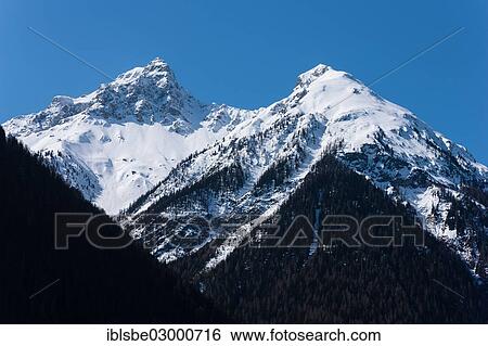 Stock Photograph - "Peaks Piz S-chalambert Dadaint and Piz S-chalambert Dadora, Sesvenna Range, Cental Eastern Alps, Alps, Scuol, Canton of Graubunden, Switzerland, Europe". Fotosearch