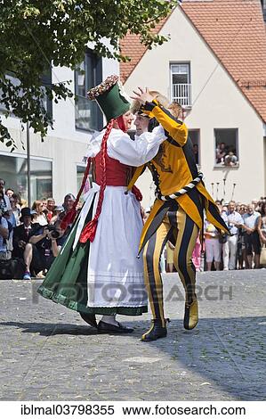 "Peasant dancing with a jester, Fischerstechen or water jousting festival, Ulm, Baden-Wurttemberg, Germany, Europe" View Large Photo Image Stock Photography - "Peasant dancing with a jester, Fischerstechen or water jousting festival, Ulm, Baden-Wurttemberg, Germany, Europe". Fotosearch