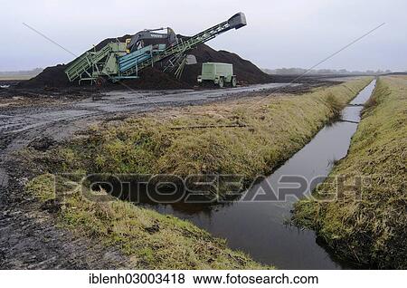 Stock Photo - "Peat extraction, drainage ditch, place of loading, Schoninghsdorf, Emsland, Lower Saxony, Germany, Europe". Fotosearch