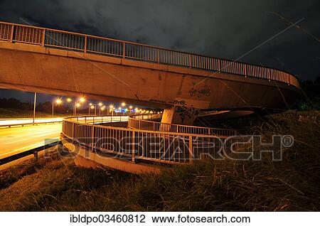 "Pedestrian bridge across the Wiener Aussenring Autobahn motorway or A21, Vienna, Vienna State, Austria, Europe" View Large Photo Image Stock Image - "Pedestrian bridge across the Wiener Aussenring Autobahn motorway or A21, Vienna, Vienna State, Austria, Europe". Fotosearch