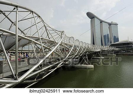 Stock Image - "Pedestrian footbridge made of steel to the Marina Bay Sands Hotel, modern architecture, Marina Bay, Central Area, Central Business District, Singapore, Asia". Fotosearch