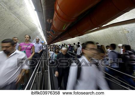 Stock Photo - "Pedestrian in a tunnel between two stations of the Metro, Sao Paulo, Brazil, South America". Fotosearch