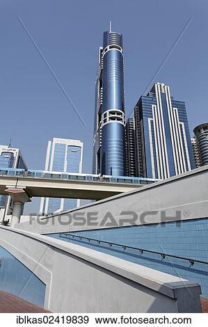 Pedestrian ramp, metro viaduct, skyscrapers, Sheikh Zayed Road, Dubai, United Arab Emirates, Middle East, Asia View Large Photo Image Stock Photo - Pedestrian ramp, metro viaduct, skyscrapers, Sheikh Zayed Road, Dubai, United Arab Emirates, Middle East, Asia. Fotosearch