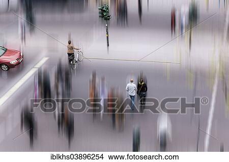 "Pedestrians crossing the road at a green traffic light, Berlin, Germany, Europe" View Large Photo Image Picture - "Pedestrians crossing the road at a green traffic light, Berlin, Germany, Europe". Fotosearch