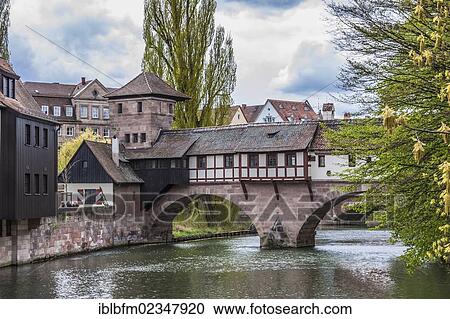 "Pegnitz river with the Henkersteg footbridge and the Henkerhaus building, Nuremberg, Middle Franconia, Bavaria, Germany, Europe" View Large Photo Image Stock Image - "Pegnitz river with the Henkersteg footbridge and the Henkerhaus building, Nuremberg, Middle Franconia, Bavaria, Germany, Europe". Fotosearch