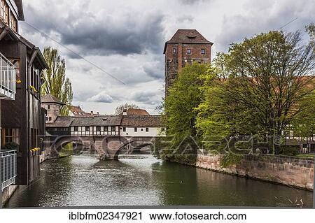 "Pegnitz river with the Henkersteg footbridge and the Henkerhaus building, Nuremberg, Middle Franconia, Bavaria, Germany, Europe" View Large Photo Image Stock Image - "Pegnitz river with the Henkersteg footbridge and the Henkerhaus building, Nuremberg, Middle Franconia, Bavaria, Germany, Europe". Fotosearch