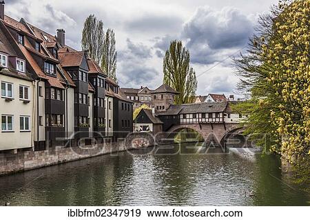 "Pegnitz river with the Henkersteg footbridge and the Henkerhaus building, Nuremberg, Middle Franconia, Bavaria, Germany, Europe" View Large Photo Image Stock Photo - "Pegnitz river with the Henkersteg footbridge and the Henkerhaus building, Nuremberg, Middle Franconia, Bavaria, Germany, Europe". Fotosearch