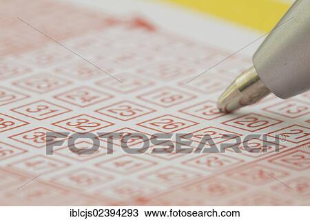 Pen crossing-off numbers on a lottery ticket View Large Photo Image Stock Image - Pen crossing-off numbers on a lottery ticket. Fotosearch