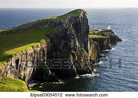Stock Image - "Peninsula with a lighthouse, Neist Point, Isle of Skye, Scotland, United Kingdom, Europe". Fotosearch