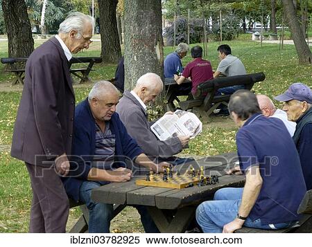 "Pensioners playing chess, Belgrade, Serbia, Europe" View Large Photo Image Stock Photography - "Pensioners playing chess, Belgrade, Serbia, Europe". Fotosearch