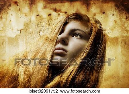 Stock Image - "Pensive girl, aged 13, artistic portrait". Fotosearch