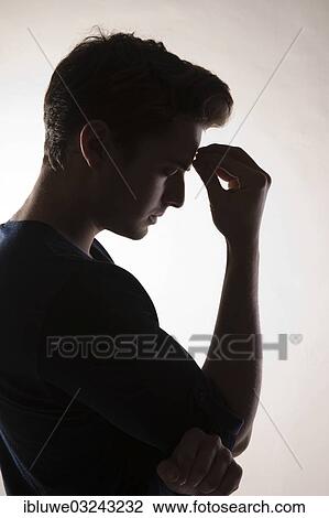 "Pensive young man, backlit, Mannheim, Baden-Wurttemberg, Germany, Europe" View Large Photo Image Stock Image - "Pensive young man, backlit, Mannheim, Baden-Wurttemberg, Germany, Europe". Fotosearch