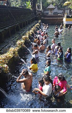 "People doing ritual ablution in the Tirta Empul Water Temple, Bali, Indonesia, Asia" View Large Photo Image Stock Photo - "People doing ritual ablution in the Tirta Empul Water Temple, Bali, Indonesia, Asia". Fotosearch