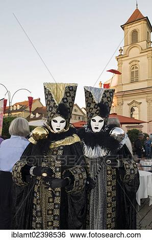 "People in Baroque costumes and masks, Dreieinigkeitskirche, Trinity Church, at back, Venetian Fair, Ludwigsburg, Baden-Wuerttemberg, Germany, Europe" View Large Photo Image Stock Photograph - "People in Baroque costumes and masks, Dreieinigkeitskirche, Trinity Church, at back, Venetian Fair, Ludwigsburg, Baden-Wuerttemberg, Germany, Europe". Fotosearch