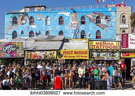 Stock Photo - "People in front of painted facade in Venice Beach, Los Angeles, California, United States, North America". Fotosearch