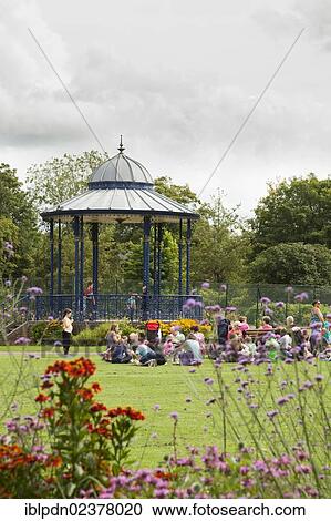 "People in the park in front of the bandstand at the War Memorial Park at Romsey, Hampshire, England, United Kingdom, Europe" View Large Photo Image Stock Image - "People in the park in front of the bandstand at the War Memorial Park at Romsey, Hampshire, England, United Kingdom, Europe". Fotosearch