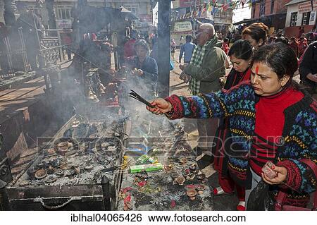 "People making offerings at Manakamana Temple, Mugling, Nepal, Asia" View Large Photo Image Stock Photograph - "People making offerings at Manakamana Temple, Mugling, Nepal, Asia". Fotosearch