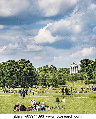"People on a meadow in the English Garden with monopteros, Munich, Upper Bavaria, Bavaria, Germany, Europe" View Large Photo Image Stock Image - "People on a meadow in the English Garden with monopteros, Munich, Upper Bavaria, Bavaria, Germany, Europe". Fotosearch