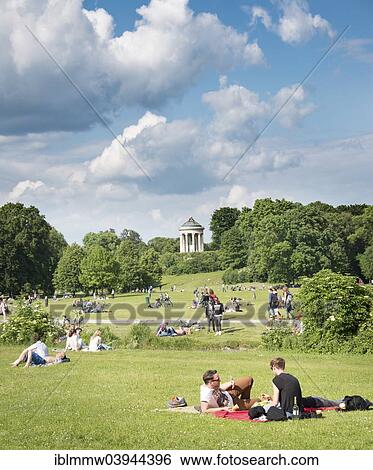 "People on a meadow in the English Garden with monopteros, Munich, Upper Bavaria, Bavaria, Germany, Europe" View Large Photo Image Stock Photograph - "People on a meadow in the English Garden with monopteros, Munich, Upper Bavaria, Bavaria, Germany, Europe". Fotosearch