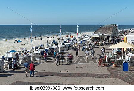 "People on the promenade at Westerland, Sylt, Schleswig-Holstein, Germany, Europe" View Large Photo Image Stock Image - "People on the promenade at Westerland, Sylt, Schleswig-Holstein, Germany, Europe". Fotosearch