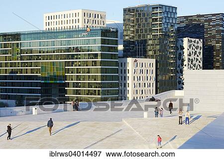 Stock Photo - "People on the roof of the Oslo Opera House, Barcode Project buildings at the back, Oslo, Norway, Europe". Fotosearch