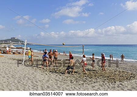 Stock Photo - "People playing volleyball on Keykobat beach, Mahmutlar, Alanya, Turkish Riviera, Province of Antalya, Mediterranean Region, Turkey, Asia". Fotosearch