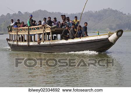 "People sitting on the roof of a ferry boat, Kaptai Lake, Rangamati, Chittagong Hill Tracts, Bangladesh, South Asia, Asia" View Large Photo Image Stock Image - "People sitting on the roof of a ferry boat, Kaptai Lake, Rangamati, Chittagong Hill Tracts, Bangladesh, South Asia, Asia". Fotosearch