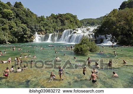 "People swimming in front of a waterfall, Krka National Park, Dalmatia, Croatia, Europe" View Large Photo Image Stock Image - "People swimming in front of a waterfall, Krka National Park, Dalmatia, Croatia, Europe". Fotosearch
