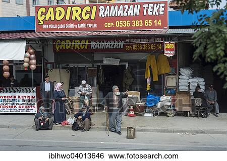 "People waiting for a shared taxi, Sukran, Konya, Turkey, Asia" View Large Photo Image Stock Photograph - "People waiting for a shared taxi, Sukran, Konya, Turkey, Asia". Fotosearch
