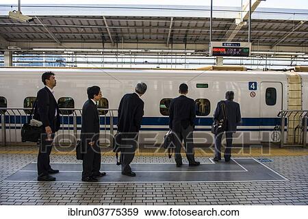 "People waiting for the Shinkanzen train, Kyoto, Japan, Asia" View Large Photo Image Stock Photo - "People waiting for the Shinkanzen train, Kyoto, Japan, Asia". Fotosearch