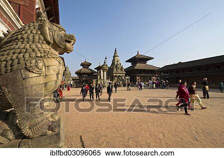 Stock Photography - "People walking on Durbar Square, the Lion Gate at front, Kathmandu Valley, Bhaktapur, Kathmandu District, Bagmati Zone, Nepal, Asia". Fotosearch