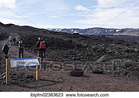 Stock Image - "People walking on track to Viti Crater, Askja, Iceland, Europe". Fotosearch