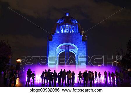 "People watching the light show and fountains in front of the Monument to the Revolution, Monumento a la Revolucion, at night, Mexico City, Federal District, Mexico, North America" View Large Photo Image Stock Photograph - "People watching the light show and fountains in front of the Monument to the Revolution, Monumento a la Revolucion, at night, Mexico City, Federal District, Mexico, North America". Fotosearch