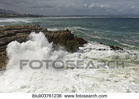 "People watching waves crashing on rocks, Hermanus, Western Cape, South Africa, Africa" View Large Photo Image Stock Photograph - "People watching waves crashing on rocks, Hermanus, Western Cape, South Africa, Africa". Fotosearch