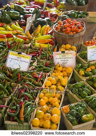 Stock Image - "Peppers on sale at Eastern Market, a large farmers market near downtown Detroit, Detroit, Michigan, USA". Fotosearch