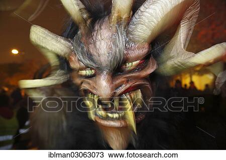 Stock Image - "Percht or Krampus from Radecker Pass, Maxglaner Krampuslauf or Perchten Procession, Maxglan, Salzburg, Salzburg State, Austria, Europe". Fotosearch