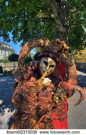 "Performer wearing a Harlequin mask and a costume, Venezianische Messe, Venetian festival, Ludwigsburg, Baden-Wuerttemberg, Germany, Europe" View Large Photo Image Stock Photograph - "Performer wearing a Harlequin mask and a costume, Venezianische Messe, Venetian festival, Ludwigsburg, Baden-Wuerttemberg, Germany, Europe". Fotosearch
