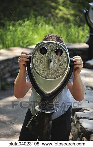 "Person at binoculars, viewpoint of Letchworth State Park, State New York, United States, North America" View Large Photo Image Stock Photo - "Person at binoculars, viewpoint of Letchworth State Park, State New York, United States, North America". Fotosearch