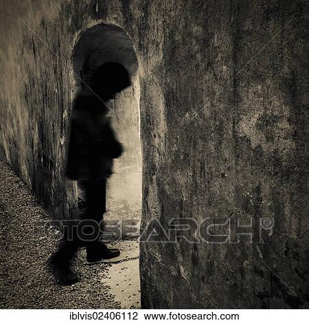 Person walking through archway View Large Photo Image Stock Image - Person walking through archway. Fotosearch