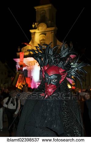 "Person with a demonic devil's mask at night, Dreieinigkeitskirche, Trinity Church, at back, Venetian Fair, Ludwigsburg, Baden-Wuerttemberg, Germany, Europe" View Large Photo Image Stock Photo - "Person with a demonic devil's mask at night, Dreieinigkeitskirche, Trinity Church, at back, Venetian Fair, Ludwigsburg, Baden-Wuerttemberg, Germany, Europe". Fotosearch