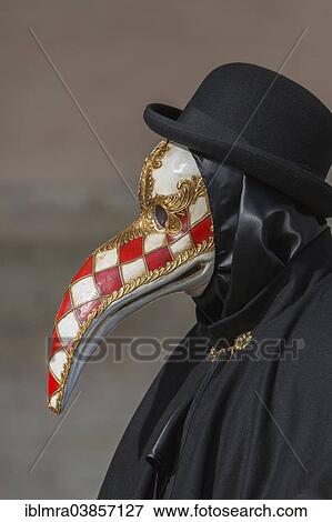 "Person with Venetian bird mask wearing a bowler hat, Venice, Italy, Europe" View Large Photo Image Stock Photo - "Person with Venetian bird mask wearing a bowler hat, Venice, Italy, Europe". Fotosearch