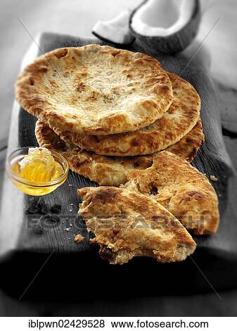 Peshwari Naan bread View Large Photo Image Stock Photo - Peshwari Naan bread. Fotosearch