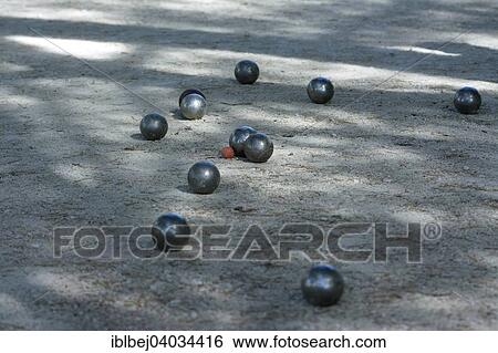 "Petanque game, Fontvieille, Bouches-du-Rhone, Provence-Alpes-Cote d'Azur, France, Europe" View Large Photo Image Stock Photograph - "Petanque game, Fontvieille, Bouches-du-Rhone, Provence-Alpes-Cote d'Azur, France, Europe". Fotosearch